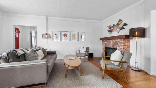 701 Broadway Street, Nakusp, BC - Indoor Photo Showing Living Room With Fireplace