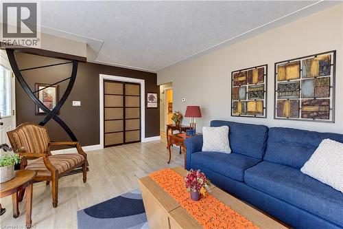 Light wood-finish flooring throughout - 87 Bond Street, Kitchener, ON 