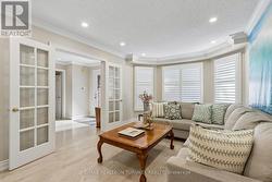 Sundrenched Living Rm w Floor to Ceiling Windows - 
