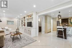 Open Concept Family Room with Built-In Enter - 