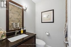 Renovated Main Floor Powder Room - 