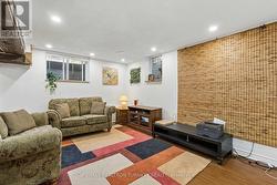 Finished Open Concept Rec Rm w 2 Egress Windows - 