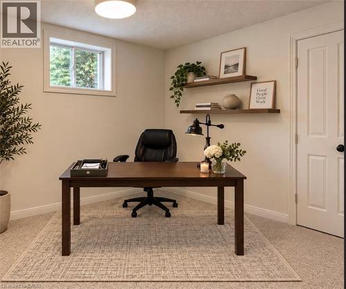 Recessed window with white trim, wall-mounted shelving, overhead flush-mount lighting, and carpeted flooring - 56 Windrush Trail, Kitchener, ON 
