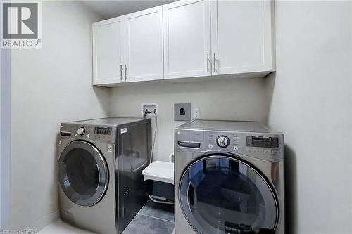 White cabinetry with brushed nickel hardware - 65 Waterview Lane, Grimsby, ON 