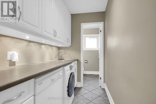 Main level laundry room/storage area. - 24 Tammela Court, Ottawa, ON 