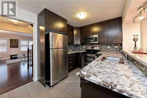 23 BEVINGTON ROAD , Brampton, Ontario L7A 0R9 5