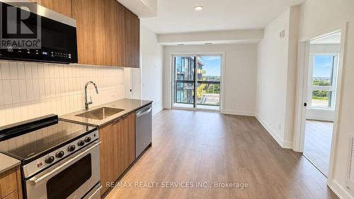 615 - 3008 WILLIAM CUTMORE BOULEVARD , Oakville, Ontario L6H 8A4 3