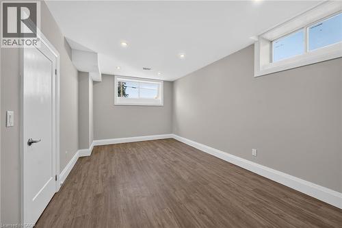 Recessed lighting, wood-finish flooring, and white trim - 41 Eleanor Avenue, Hamilton, ON 