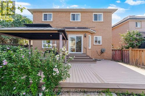 backyard with composit decking - 975 Mantle Crescent, Mississauga, ON 