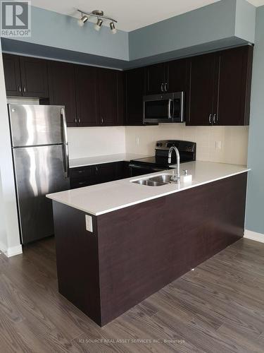 423 - 3560 ST. CLAIR AVENUE E , Toronto, Ontario M1K 0A9 4