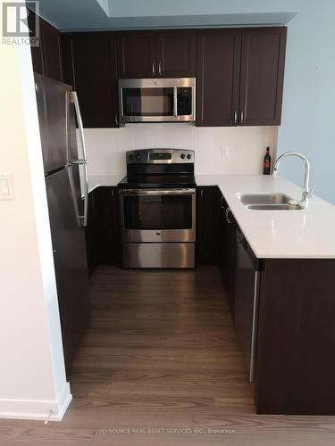 423 - 3560 ST. CLAIR AVENUE E , Toronto, Ontario M1K 0A9 5