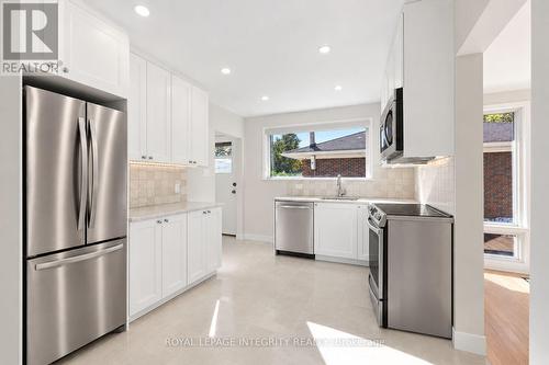Fridge and stove virtually staged - 2007 Dorval Avenue, Ottawa, ON 