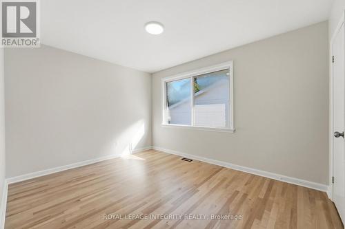 Bedroom with large window, plenty of natural light - 2007 Dorval Avenue, Ottawa, ON 