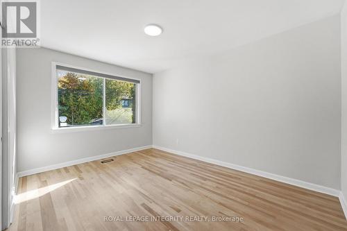 Bedroom with large window, plenty of natural light - 2007 Dorval Avenue, Ottawa, ON 