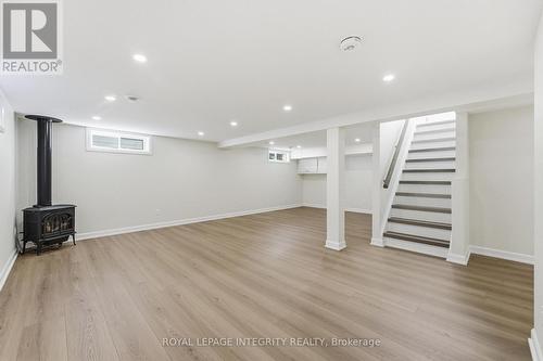 Lower level family room with gas fireplace - 2007 Dorval Avenue, Ottawa, ON 