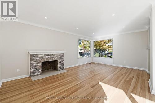 Large living room. Fireplace is decorative only. - 2007 Dorval Avenue, Ottawa, ON 