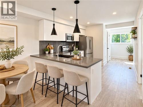 654 DUNSMURE Road , Hamilton, Ontario L8H 1H7 4