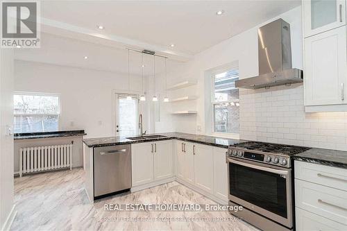 56 OAKWOOD AVENUE , Toronto, Ontario M6H 2V6 5