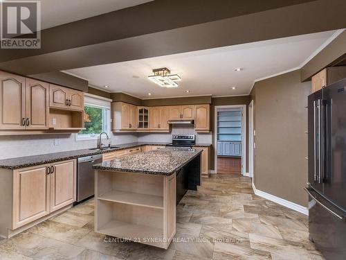 Granite counters and ample cabinetry throughout. - 2298 Bowman Road, Ottawa, ON 
