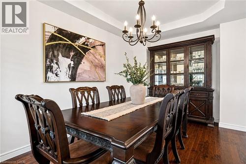 Elegant Formal Dining Room w/ Dining Hutch - 53 Valiant Circle, Binbrook, ON 