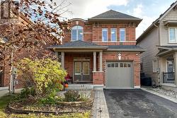203 LADY ANGELA AVENUE Oshawa, ON L1L 0K3