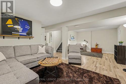 Family room in basement: newer flooring! - 4 Degas Court, Ottawa, ON 