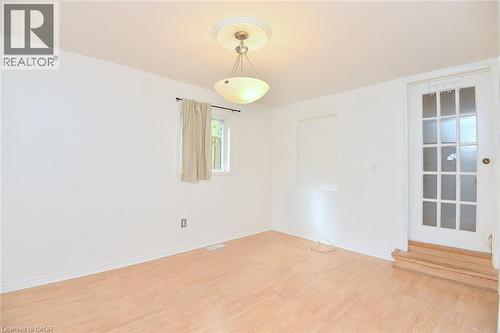 A few steps up to the Kitchen and Primary Bedroom - 201 Strathearne Avenue, Hamilton, ON 