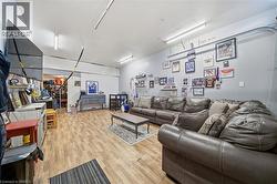 Finished space with wood-finish flooring and integrated strip lighting - 