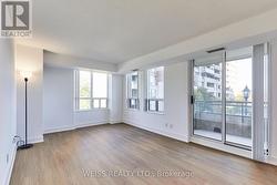Combined Living/Dining Room w/ Balcony Walk-Out - 