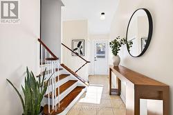 Private Foyer with Door to Back and Front yards. - 