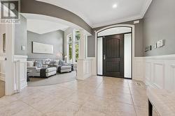 Den Features a Vaulted Ceiling & Hardwood Flooring - 
