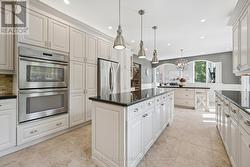 Gourmet Kitchen Offers Refinished Maple Cabinetry - 