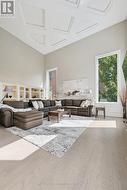 Living Room Offers Soaring 18' Decorative Ceiling - 