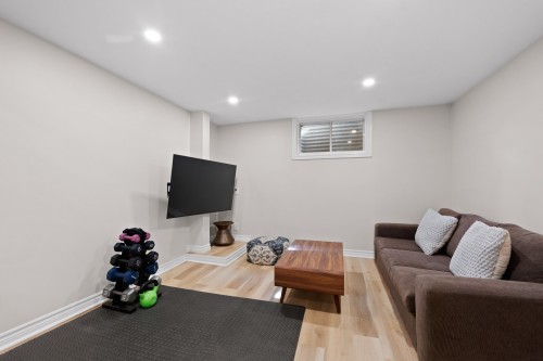 Family Room - 8 Av. Hébert, Candiac, QC - Indoor Photo Showing Basement