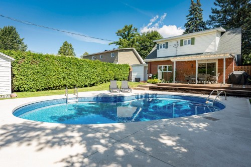 Pool - 8 Av. Hébert, Candiac, QC - Outdoor With In Ground Pool With Deck Patio Veranda With Backyard