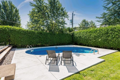 Pool - 8 Av. Hébert, Candiac, QC - Outdoor With In Ground Pool With Backyard