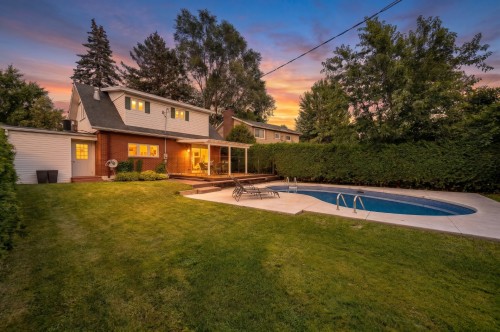 Courtyard - 8 Av. Hébert, Candiac, QC - Outdoor With In Ground Pool With Deck Patio Veranda