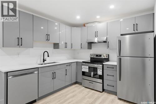 713 Brighton Boulevard, Saskatoon, SK - Indoor Photo Showing Kitchen With Double Sink With Upgraded Kitchen
