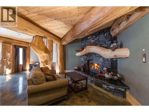525 Feathertop Way, Big White, BC - Indoor Photo Showing Living Room With Fireplace