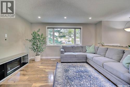 6918 1St Avenue N, Regina, SK - Indoor Photo Showing Living Room With Fireplace