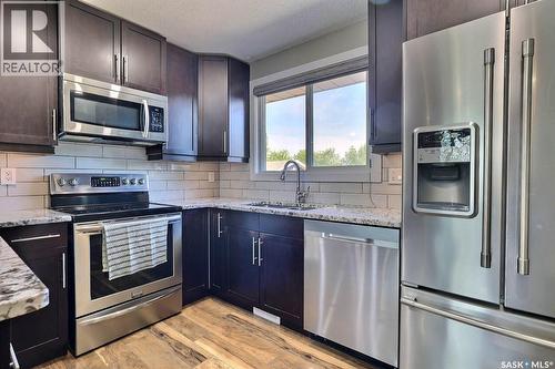 6918 1St Avenue N, Regina, SK - Indoor Photo Showing Kitchen With Stainless Steel Kitchen With Upgraded Kitchen