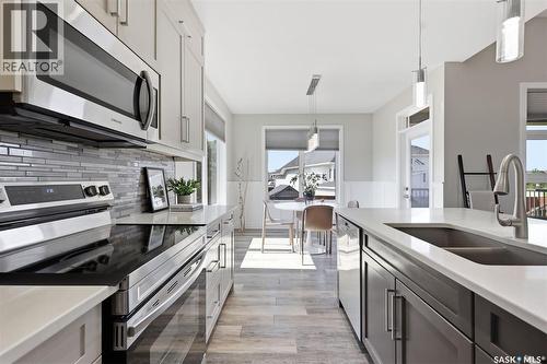 814 Werschner Court, Saskatoon, SK - Indoor Photo Showing Kitchen With Double Sink With Upgraded Kitchen