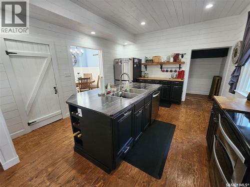 1401 3Rd Street, Estevan, SK - Indoor Photo Showing Kitchen With Double Sink