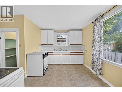 691 3Rd Avenue, Fernie, BC - Indoor Photo Showing Kitchen With Double Sink