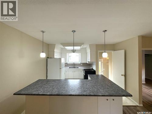 435 2Nd Avenue, Allan, SK - Indoor Photo Showing Kitchen With Double Sink