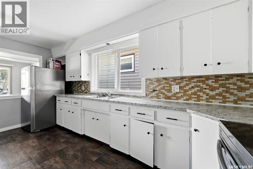 1321 Victoria Avenue, Regina, SK - Indoor Photo Showing Kitchen With Double Sink