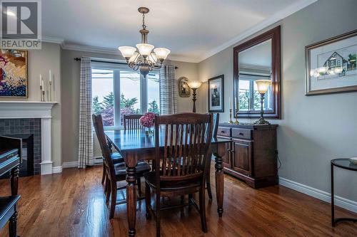 32 Dawsons Run, Conception Bay South, NL - Indoor Photo Showing Dining Room With Fireplace