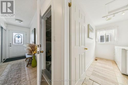 Hallway garage access and Laundry - 245 Centennial Forest Drive, Milton, ON - Indoor Photo Showing Other Room