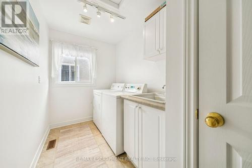 Main floor laundry room - 245 Centennial Forest Drive, Milton, ON - Indoor Photo Showing Laundry Room