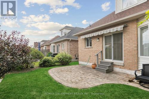 Backyard patio with awning - 245 Centennial Forest Drive, Milton, ON - Outdoor